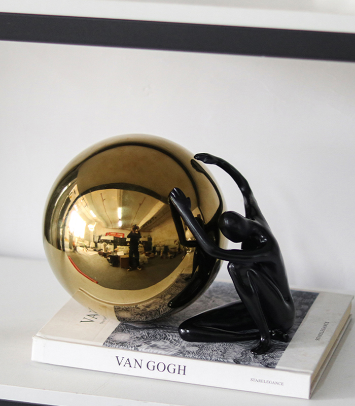 Creative Ball Holding Man Sculpture
