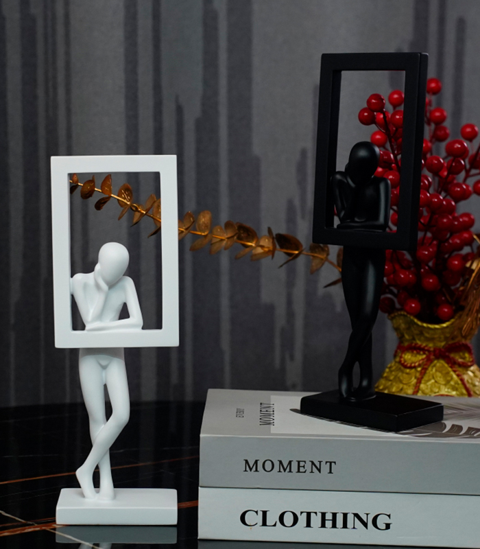Abstract Resin Couple Statue Leaning on Frame