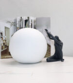 Creative Ball Holding Man Sculpture