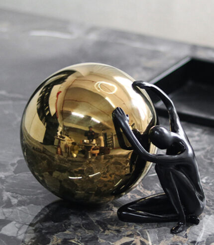 Creative Ball Holding Man Sculpture